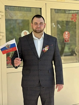 Николай